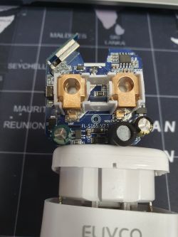 Inside of Electronic Socket with Module View of the inside of an electronic socket with visible module and component labels.