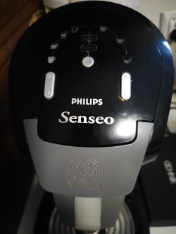 Panel sterowania ekspresu Philips Senseo HD7850 z widocznymi przyciskami i kontrolkami
