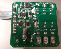Electronic device circuit board with visible components.