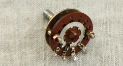 Close-up of a vintage rotary switch with soldered wire terminals