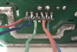 PCB with wires soldered to WB2S module pins Close-up of a PCB with five colored wires soldered to the pins of a WB2S module.