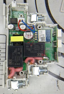 Interior of a smart relay module with visible electronic components