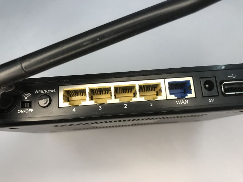 Analysis of the inside of the router, memory ripping, bootloader, custom program for UART