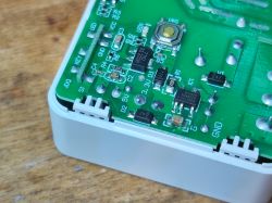 Interior of a Smart Switch with PCB Close-up of the interior of a smart switch with a PCB and visible electronic components.