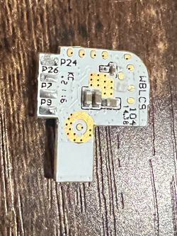 PCB Module with WBLC9 Label PCB module with electronic components; visible text: WBLC9 and pin labels.