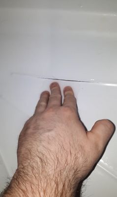 Shower cubicle - the base of the shower cubicle is cracked + cracked b