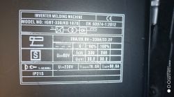 Nameplate of an inverter welding machine with blurred text.