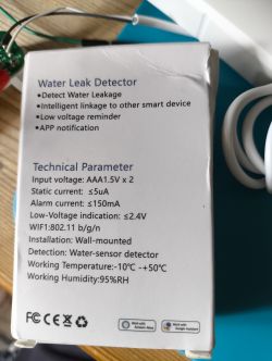 Water Leak Detector Box Image of a water leak detector box with technical specifications displayed.