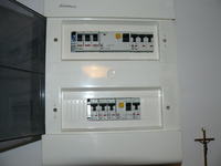 High-Pitched Sound from Fuse Box when 3.5 kW Air Conditioner is On in a 12.5 kW Apartment