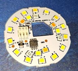 LED smart bulb circuit board with LEDs and integrated circuits.