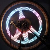 Circular ring with a three-segment illuminated pattern, top-down view on a dark background