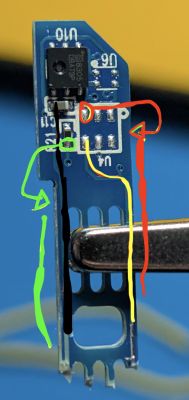 Optical sensor module with color-marked signal paths on a small blue PCB