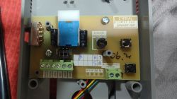 Cyfral 5P Intercom Interior Interior of Cyfral 5P intercom showing circuit board and wiring.