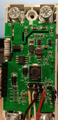 Close-up of a circuit board with electronic components and wired connections