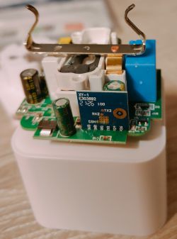 Interior of a Wi-Fi Smart Socket Interior of a Wi-Fi smart socket with visible circuit board and electronic components.