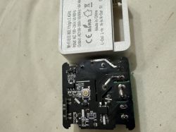 Wi-Fi controller with visible internal components and casing.