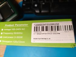 Product packaging with technical specifications and a barcode.