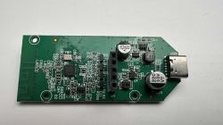 Printed Circuit Board with BK7231N Chip The image shows a printed circuit board with electronic components and a USB connector on the right.