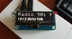 OLED display with internet radio information and time.