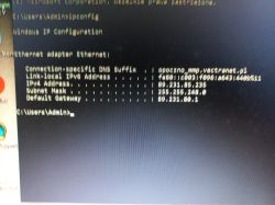 Zrzut ekranu z wiersza polecenia Windows z wynikiem komendy ipconfig