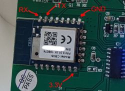 CB3S Module on Circuit Board with Labeled Pins Close-up of a circuit board featuring a CB3S module with labeled RX, TX, GND, and 3.3V pins along with other components.