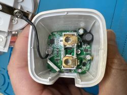 Inside of XT-BL02 smart power plug with visible PCB and power measurement components