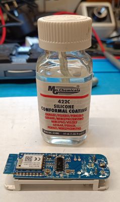 MG Chemicals silicone coating bottle and sensor PCB with electronics