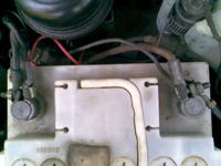 jak podpiąć kable pod akumulator??