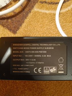 Zasilacz Shenzhen Gospell Digital Technology Co., Ltd. z etykietą podającą dane techniczne.