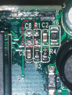 Close-up of a circuit board with a missing C6 capacitor marked.