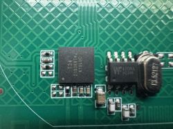 T34 chip on green PCB board Close-up of T34 chip and other electronic components on green PCB