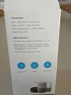 Box displaying technical specifications for a 9W RGBWW Wi-Fi bulb.