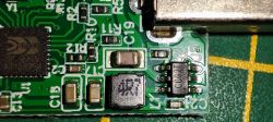 Inside View of ONENUO ZHQ01 Micro Smart USB Switch Close-up of the internal structure of a micro smart USB switch showing electronic components.