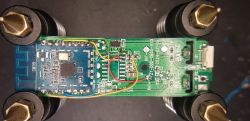 Close-up of a circuit board with soldered wires and a CB3S module.