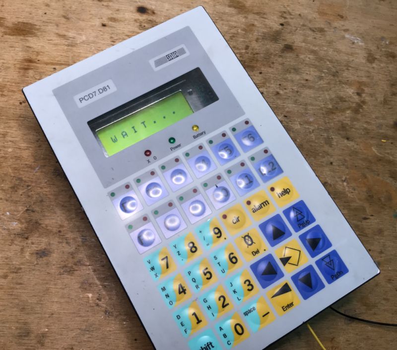 Control Panel with Display and Keyboard Control panel with WAIT displayed on the screen.