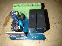 MINI-W1 WiFi Switch Module WiFi switch module with two relays and electronic components.
