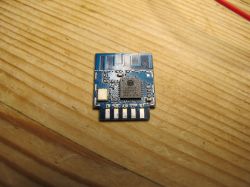 WL2S Module with Lightning Semiconductor LN882H Chip WL2S electronic module on a wooden surface