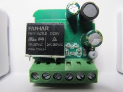 PCB with FANHAR relay and capacitors.