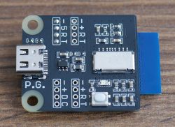 Electronic Module with USB-C Port Electronic module on a wooden background, with a USB-C port and SMT components.