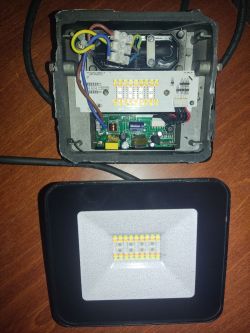 Interior of Nedis SmartLife LED Floodlight Interior of an LED floodlight with a PCB and connected wiring.