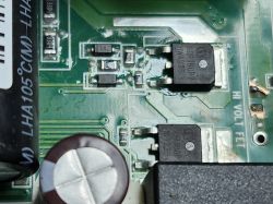Printed circuit board with transistors and capacitor Close-up of printed circuit board with transistors, capacitor, and HI VOLT FET label
