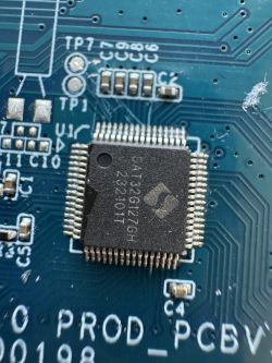 Close-up of a circuit board with an Allwinner XR806 chip.