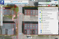 Fragment mapy Geoportal z widoczną infrastrukturą energetyczną przy garażach