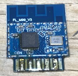 FL_M99_V3 Module on Blue PCB FL_M99_V3 module with a microcontroller on a blue PCB marked with 26.000 MHz.