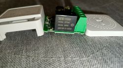 Yuthon relay module with green terminals and opened white casing