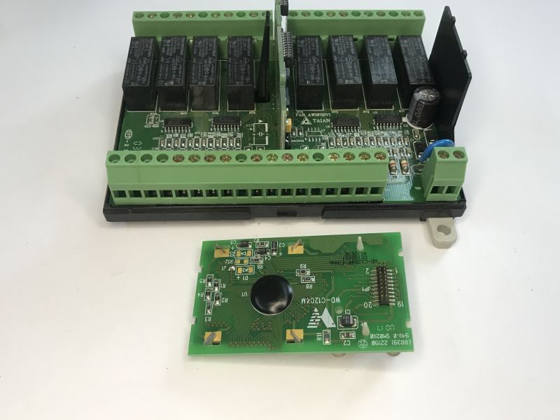 The interior of an old Schneider Electric SR1 A201BD programmable logic controller