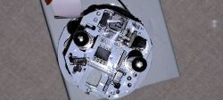 Interior of Dismantled Smart Socket Image of the interior of a dismantled smart socket with visible electronic components.