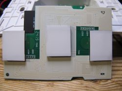 Interior of Cozylife DS-1211AN Wall Switch Interior of the Cozylife DS-1211AN 3-gang touch wall switch showing the circuit board and components.