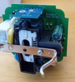 Interior of a Smart Plug with PCB WP02GE-F Interior of a smart plug with a PCB labeled WP02GE-F 2023-08-04.