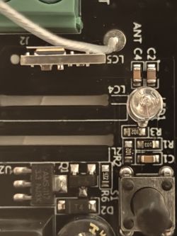 Circuit Board with Electronic Components Close-up of a circuit board with visible electronic components and connections.